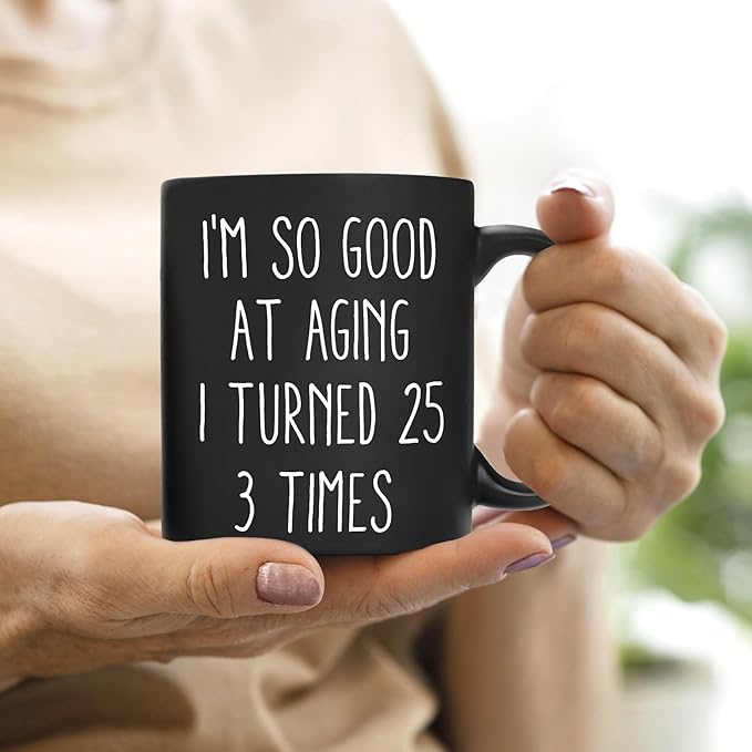 QASHWEY 75th Birthday Gifts for Women Men Coffee Mug, Funny Coffee Mug, I'm So Good At Aging I Turned 25 3 Times Black Coffee Cups, 75 Birthday Gifts for Women Tea Cup Mug Cup