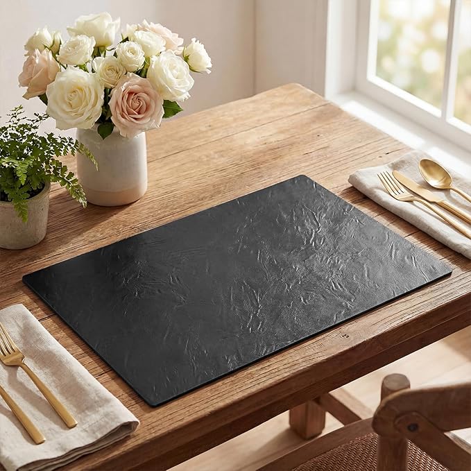Artoid Mode Black Faux Leather Placemats Set of 4, 12x18 Inch Waterproof Wipeable Heat Resistant Place Mats, Reversible Table Mats for Kitchen Dining Decor