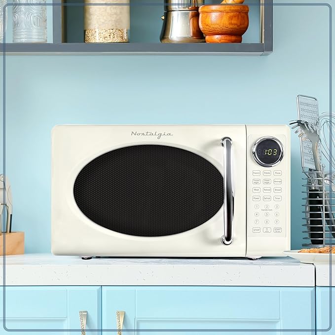 Nostalgia Retro 700W Microwave Oven 0.7 Cu Ft Capacity ??Child Safety Lock, 8 Auto-Cook Settings ??Countertop Kitchen Appliance ??Ivory