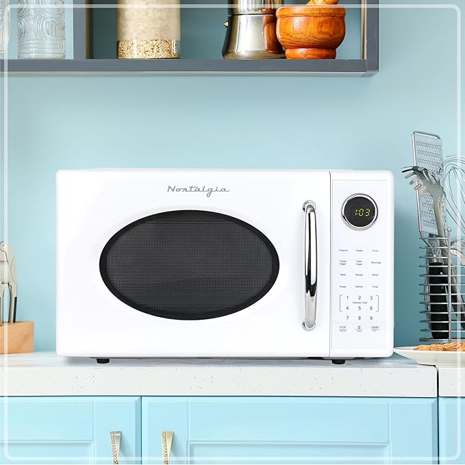 Nostalgia Retro 1000W Microwave Oven 1.1 Cu Ft Capacity ??Child Safety Lock, 8 Auto-Cook Settings ??Countertop Kitchen Appliance ??White