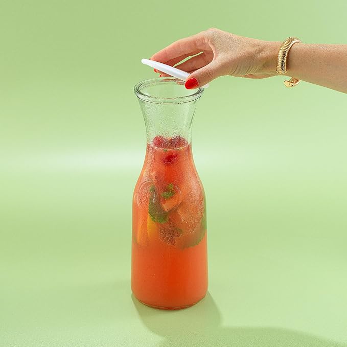 JoyJolt Glass Carafe with Lid, Set of 4 ??1 Liter Glass Pitcher for Mimosa Bar, Water, Iced Tea, Juice, Wine, Lemonade, Milk ??Dishwasher Safe Beverage Drink Dispensers for Brunch, Parties