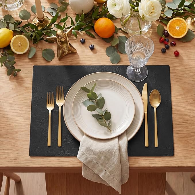 Artoid Mode Black Faux Leather Placemats Set of 4, 12x18 Inch Waterproof Wipeable Heat Resistant Place Mats, Reversible Table Mats for Kitchen Dining Decor